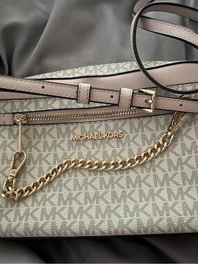 Michael Kors Beige and Pale Pink small crossbody purse.